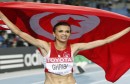 Ghribi celebrates placing second in the women's 3,000 metres steeplechase final at the IAAF World Athletics Championships in Daegu