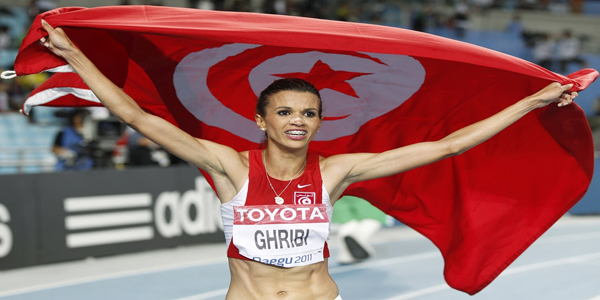 Ghribi celebrates placing second in the women's 3,000 metres steeplechase final at the IAAF World Athletics Championships in Daegu